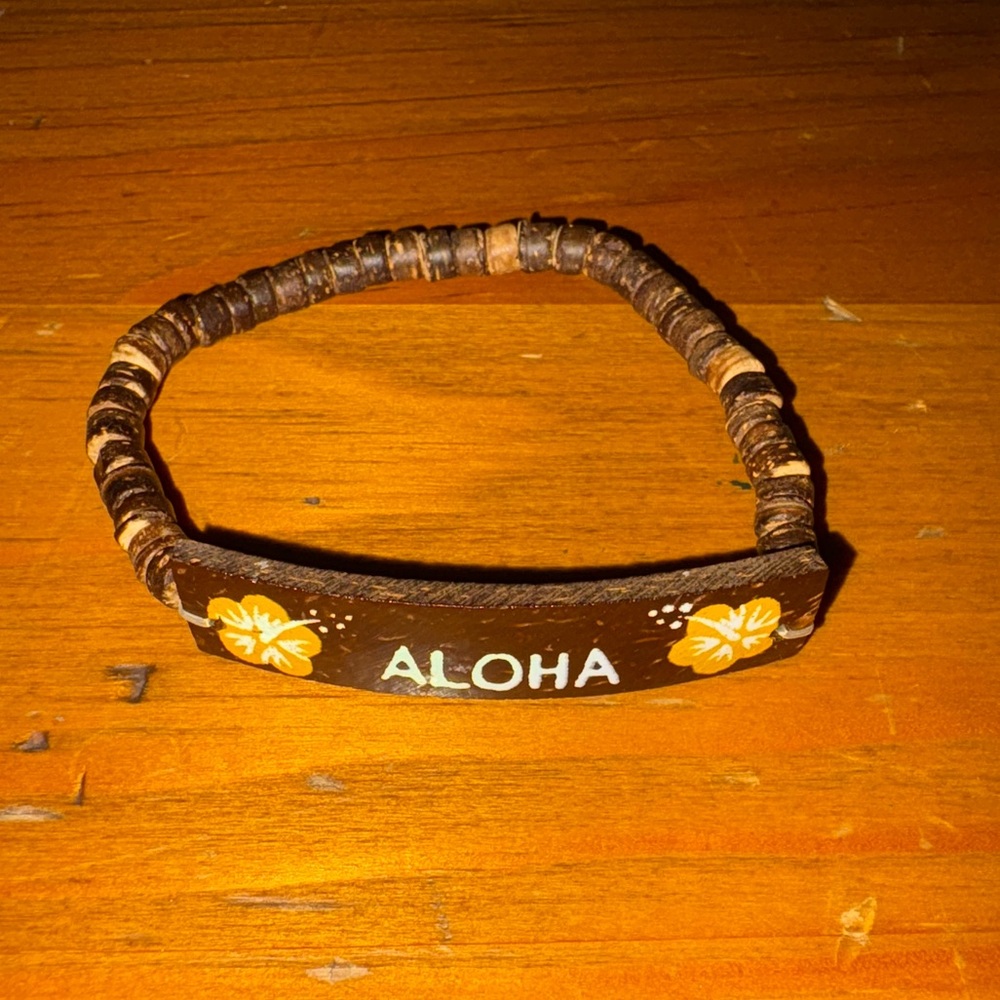 Brown Aloha Handmade Bracelet with Yellow Floral Accents from Natural Materials